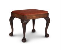 A GEORGE II CARVED MAHOGANY STOOL, CIRCA 1750