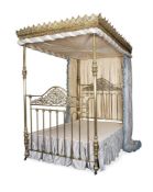A VICTORIAN GILT BRASS FOUR POST BED, CIRCA 1873
