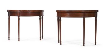 A PAIR OF GEORGE III MAHOGANY SEMI-ELLIPTICAL FOLDING TEA TABLES, CIRCA 1790