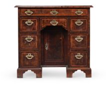 A GEORGE II BURR YEW AND LINE INLAID KNEEHOLE DESK, CIRCA 1740