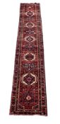 A KARAJAR RUNNER, approximately 498 x 90cm
