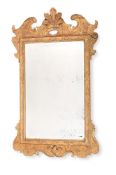 A GEORGE II CARVED GILT GESSO MIRROR, CIRCA 1730-40