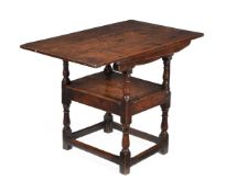 AN OAK METAMORPHIC CHAIR-TABLE, MID 17TH CENTURY