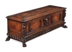 AN ITALIAN CARVED WALNUT AND INLAID CASSONE, EARLY 17TH CENTURY AND LATER ELEMENTS