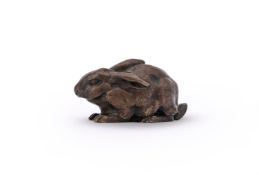 ANTOINE-LOUIS BARYE (FRENCH, 1795-1875), A BRONZE MODEL OF A CROUCHING RABBIT