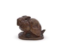 ANTOINE-LOUIS BARYE (FRENCH, 1795-1875), A BRONZE MODEL OF A CROUCHING RABBIT