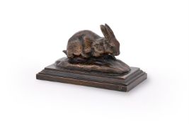 ANTOINE-LOUIS BARYE (FRENCH, 1795-1875), A BRONZE MODEL OF A CROUCHING RABBIT