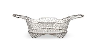 A DUTCH SILVER TWIN HANDLED SHAPED OVAL PIERCED BASKET