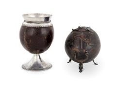 A 17TH CENTURY SILVER MOUNTED COCONUT CUP
