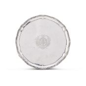 A GEORGE III SILVER SHAPED CIRCULAR SALVER
