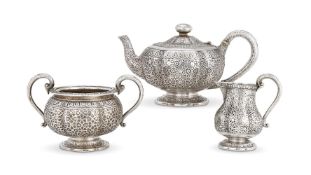 Y A VICTORIAN SILVER LOBED BALUSTER THREE PIECE TEA SET