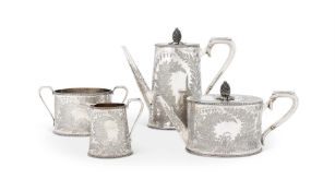 Y A VICTORIAN SILVER FOUR PIECE TAPERING OVAL TEA AND COFFEE SET