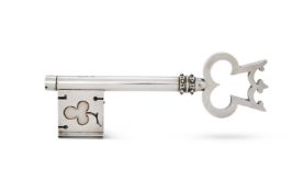 A VICTORIAN SILVER STAMP BOX IN THE FORM OF A KEY