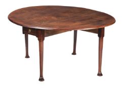 A MAHOGANY OVAL TWIN DROP LEAF DINING TABLE