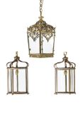 A BRASS LANTERN OF TAPERED FORM