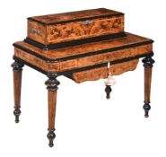 Y A FINE SWISS FIGURED WALNUT INTERCHANGEABLE CYLINDER MUSIC BOX ON TABLE