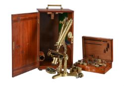 A VICTORIAN LACQUERED BRASS BINOCULAR MICROSCOPE