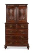 AN ANGLO-INDIAN EXOTIC HARDWOOD CABINET ON CHEST, THIRD QUARTER 19TH CENTURY