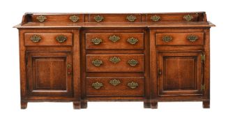 A GEORGE III OAK DRESSER BASE