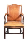 A LEATHER UPHOLSTERED OPEN ARMCHAIR IN GEORGE III STYLE