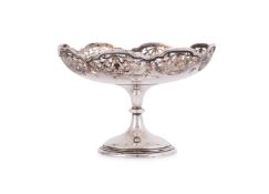 A SILVER SHAPED CIRCULAR PEDESTAL DISH