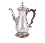 A GEORGE III SILVER BALUSTER COFFEE POT