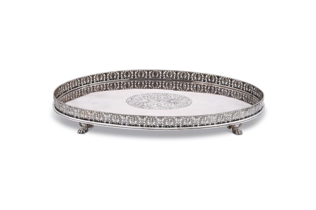 A CONTINENTAL SILVER COLOURED OVAL GALLERY TRAY