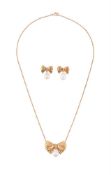 WILLIAM & SON, A CULTURED PEARL AND DIAMOND BOW PENDANT, AND A PAIR OF SIMILAR EARRINGS