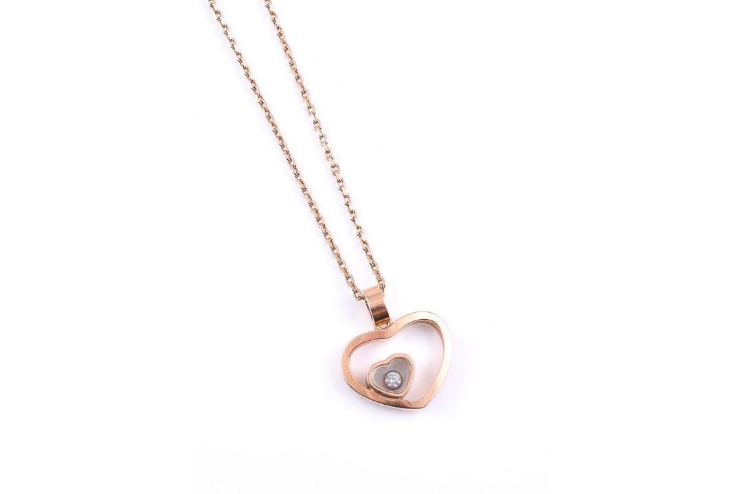 CHOPARD, HAPPY DIAMOND, A DIAMOND HEART PENDANT ON CHAIN