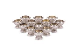 THIRTEEN GEORGE III SILVER URN SHAPED SALTS