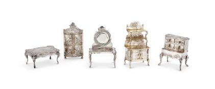 A COLLECTION OF SILVER MINIATURE FURNITURE