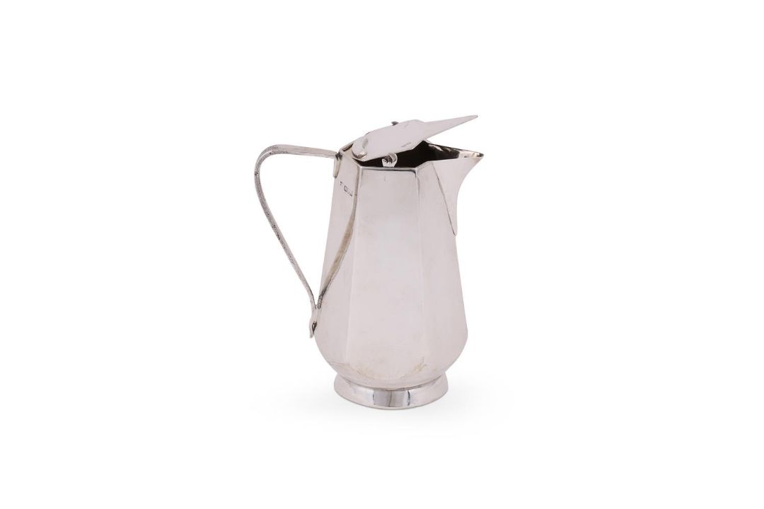 A SILVER HEXAGONAL TAPERING JUG - Image 1 of 2