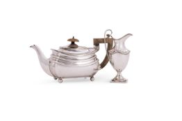 A SILVER OBLONG BALUSTER TEA POT