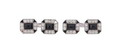 A PAIR OF ART DECO DIAMOND AND ONYX CUFFLINKS, CIRCA 1930