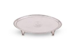 A GEORGE III SILVER OVAL TEAPOT STAND