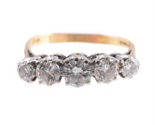 A FIVE STONE DIAMOND RING, LONDON 1975