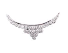 A DIAMOND CRESCENT BROOCH