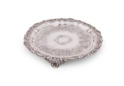 A GEORGE IV SILVER SHAPED CIRCULAR SALVER