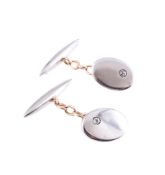 A PAIR OF TWO COLOUR DIAMOND SET CUFFLINKS, SECOND QUARTER OF THE 20TH CENTURY
