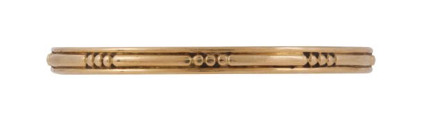 AN 18 CARAT GOLD BANGLE, LONDON 1989 IMPORT MARK