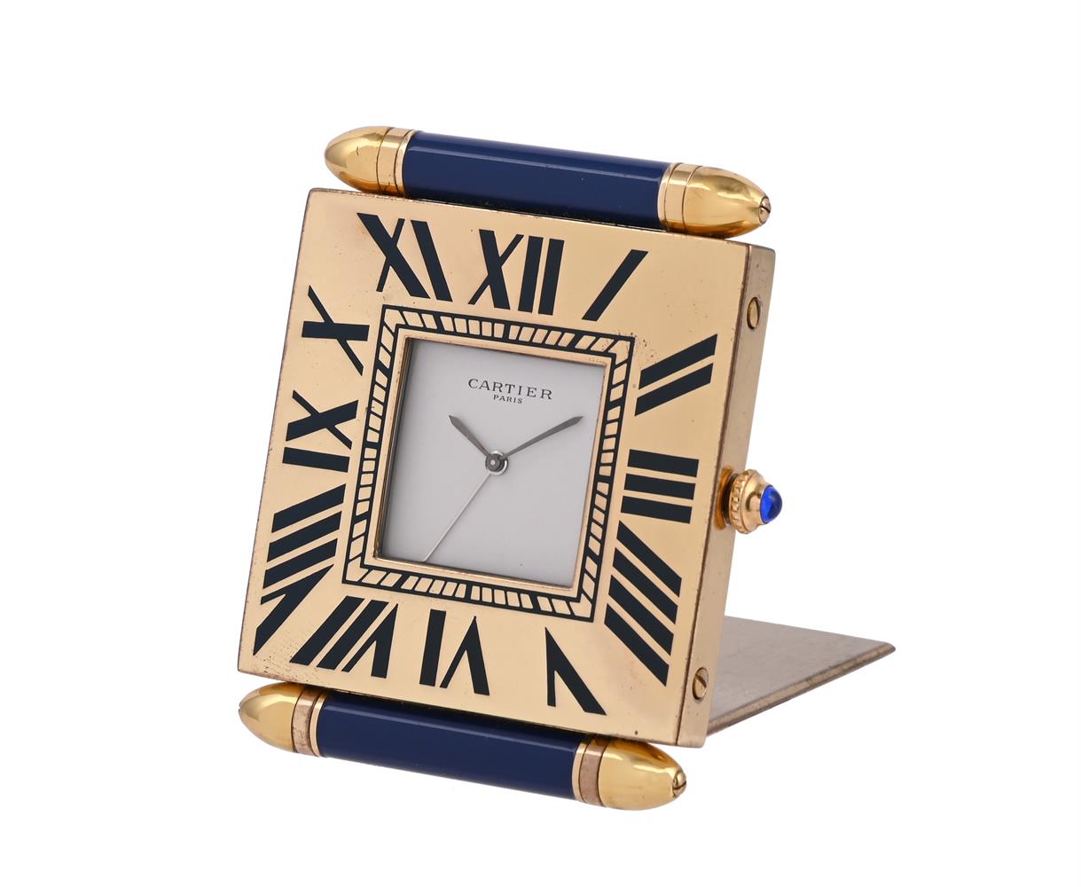 CARTIER, A BRASS TRAVELLING ALARM DESK CLOCK