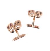 A PAIR OF 9 CARAT GOLD COMEDY AND TRAGEDY MASK CUFFLINKS, LONDON 1979