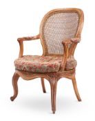 A LOUIS XV FRUITWOOD OPEN ARMCHAIR, CIRCA 1770