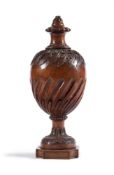AN EARLY GEORGE III CARVED URN FINIAL ATTRIBUTED TO JAMES GIBBS, CIRCA 1760-1780