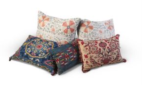 A GROUP OF FIVE CUSHIONS COMPRISING A KAITAG EMBROIDERED CUSHION, CAUCASUS, 17TH/18TH CENTURY