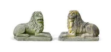 A PAIR OF ITALIAN CARVED STONE RECUMBENT LIONS, LATE 19TH CENTURY