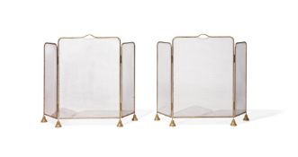 TWO BRASS FOLDING SPARK GUARDS BY ROBERT KIME LTD, IN EARLY 20TH CENTURY STYLE