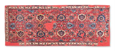 A CAUCASIAN FRAGMENTARY CARPET OF 'HARSHANG' OR 'BLOSSOM' DESIGN, FIRST HALF 18TH CENTURY