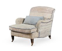 A VICTORIAN EBONISED ARMCHAIR IN THE MANNER OF HOWARD AND SONS, LATE 19TH CENTURY