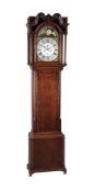 AN OAK AND MAHOGANY LONGCASE CLOCK